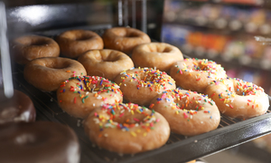 A display of Casey's Cake Donuts with sprinkles