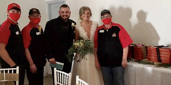 Wedding couple and Casey's team