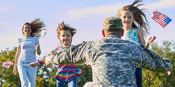 Military servicemember coming home to family