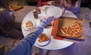 Pizza, snacks, and drinks at a sleepover party
