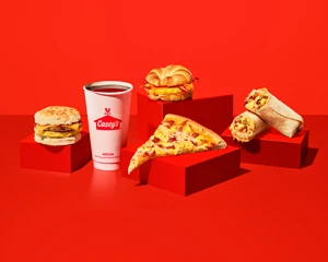lineup of Casey's breakfast items on a red background