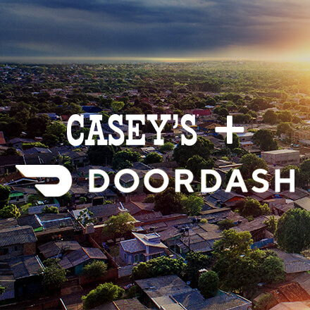 Casey's and DoorDash logos with a neighborhood in background