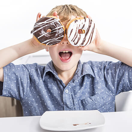 boy with donuts