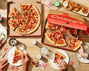table of casey's pizza and wings