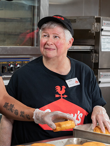 Kitchen shift lead at Casey's wearing a Casey's uniform