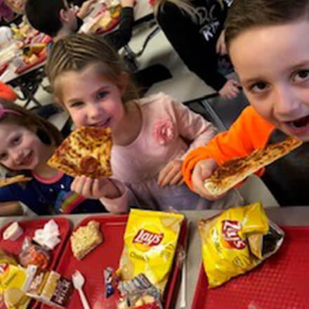 Students having pizza