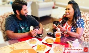 Influencer Jenifer Charls and her spouse playing cards with Casey's food at a game night