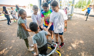 Elementary school kids playing on the playground