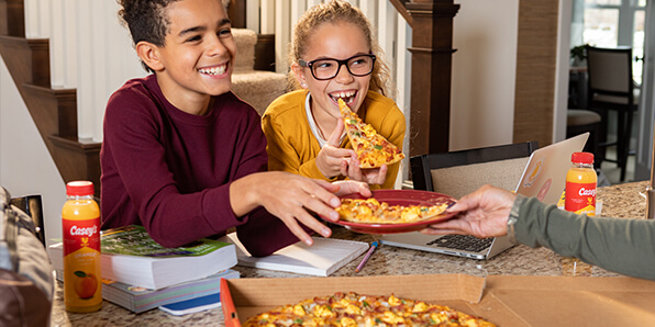 children eating Ultimate Breakfast Pizza